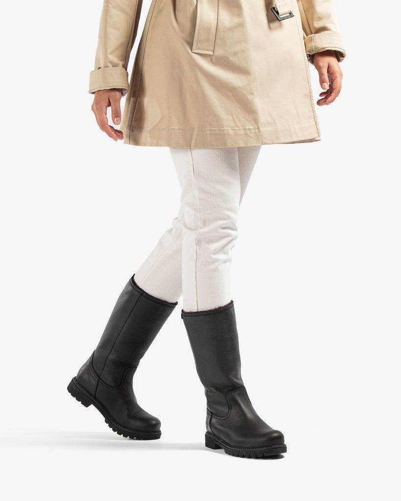 Bambina botas de piel con forro interior de pelo. negro