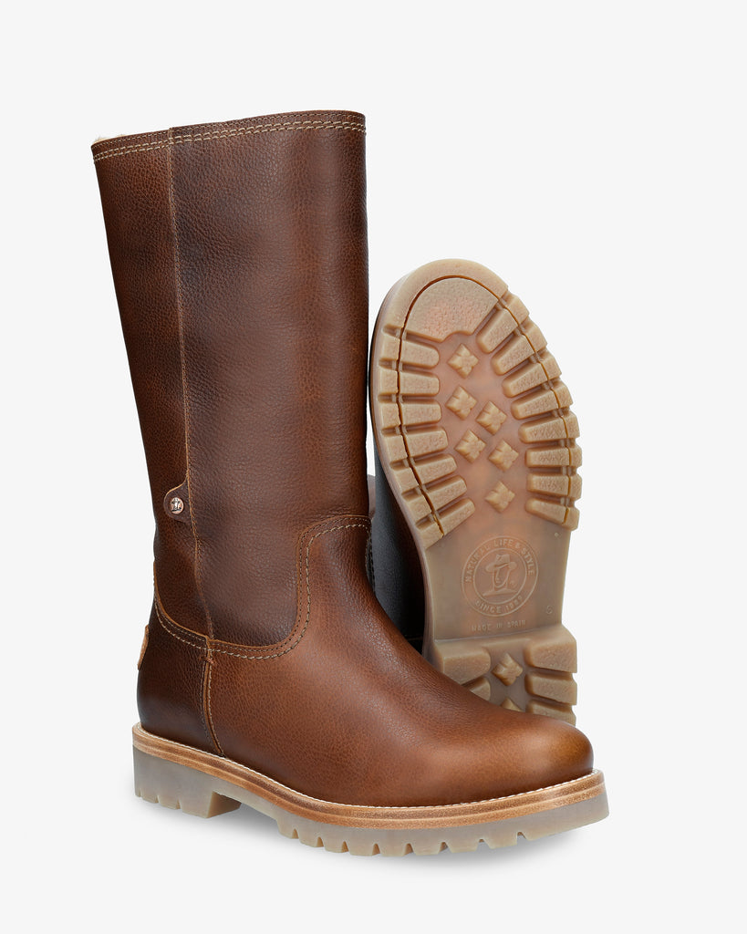 Bambina botas de piel con forro interior de pelo. cuero