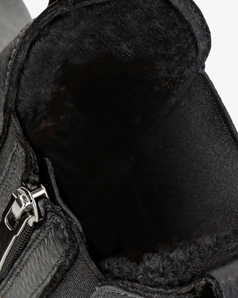 Beny Igloo botín de piel con forro interior de pelo natural. negro