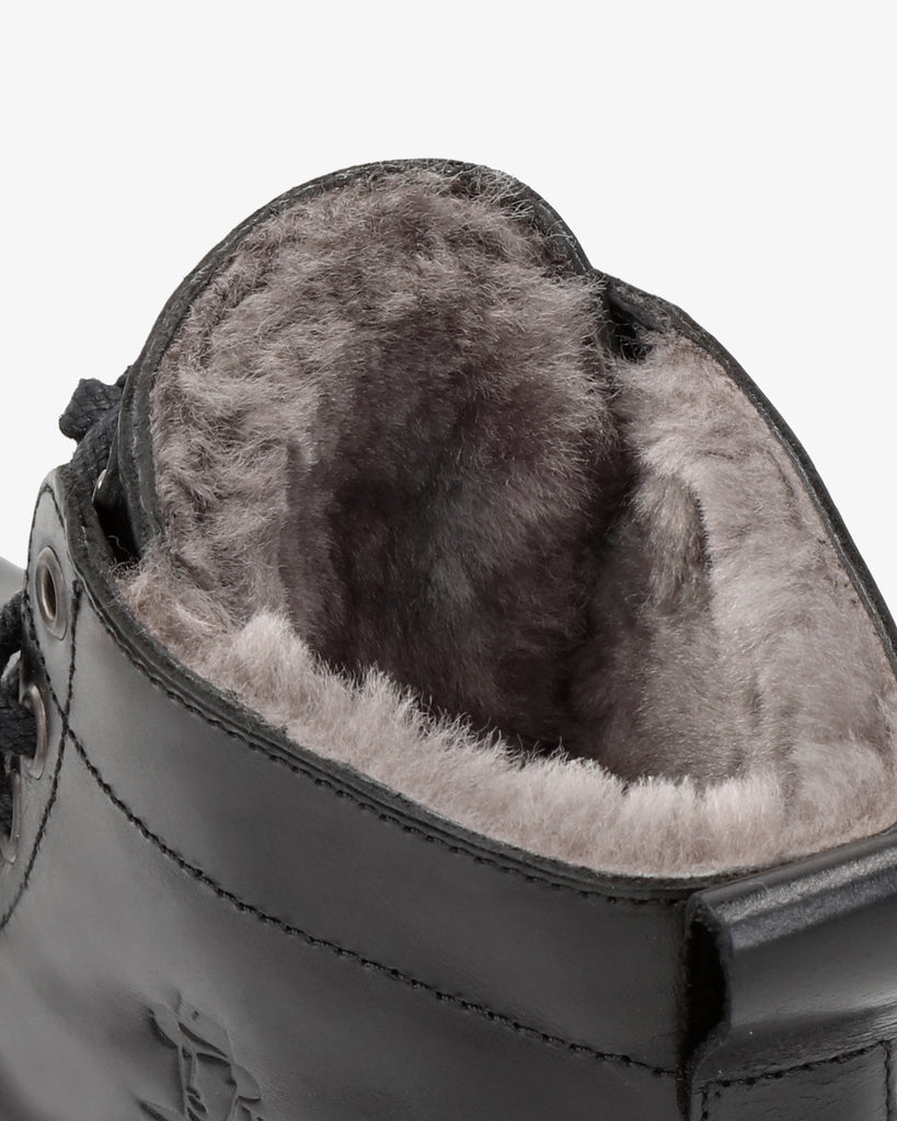 Emery Igloo botines de piel con forro interior de pelo natural. negro