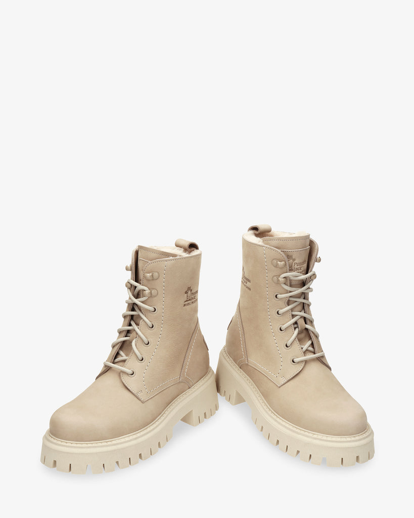 Farai botas de piel con forro interior de pelo. crudo