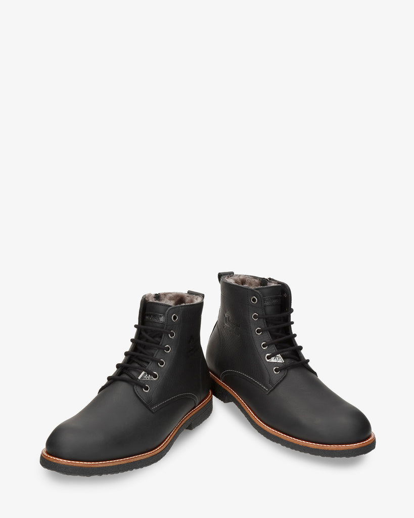 German Igloo botín de piel con forro interior de pelo natural. negro