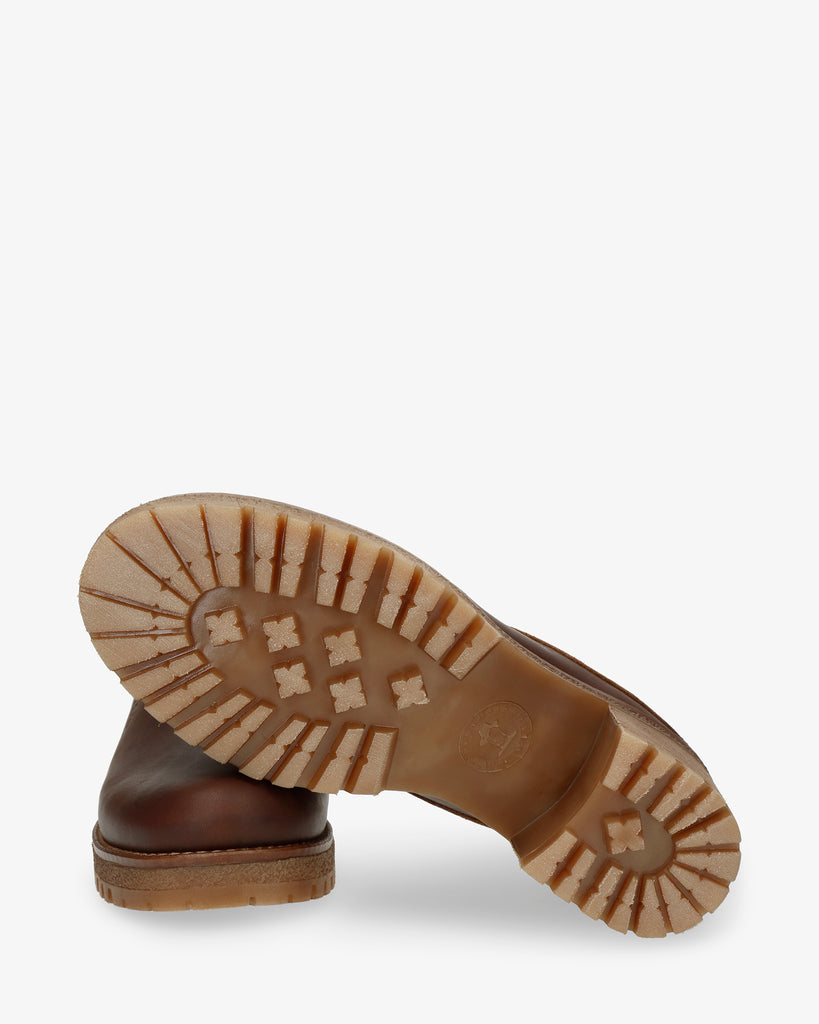 Priana Igloo zueco de piel con forro interior de pelo natural. cuero